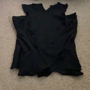 Black long sleeve with fringe at the end.